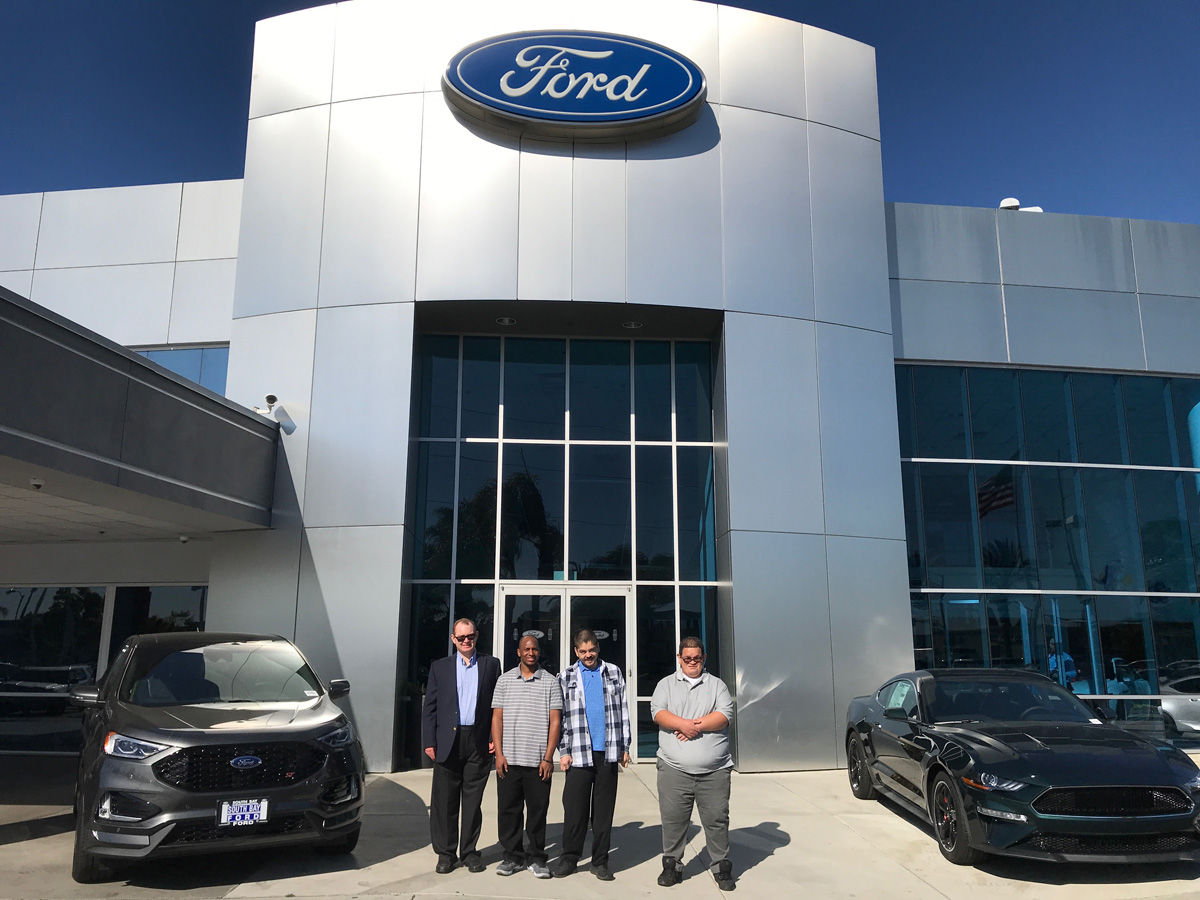 Mychal's Learning Place autistic student Angel Villa works at South Bay Ford